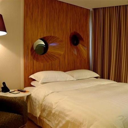 Brook Hotel Hangzhou Oda fotoğraf